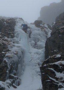 Central Gully Left Branch, Great End, Lake District. Kasia leading the grade III crux pitch on Saturday February 9th 2013.