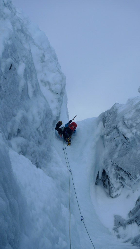 Kasia leading the Rogue 3rd pitch on Point 5 Gully, Ben Nevis