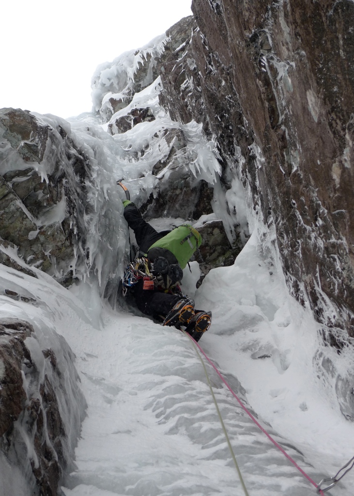 Rich Allen about to surmount the bulge that opens the way on the superb third pitch of Minus 1 Gully, Ben Nevis.