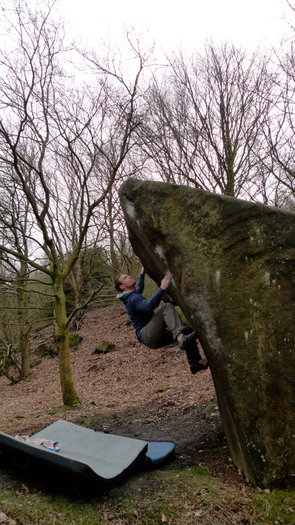 James Parkinson sporting the Arc'teryx Quiq Hoody whilst out bouldering at Caley Crag