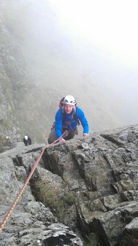 James testing how the pack carries whilst climbing. Botterill's Slab, Scafell Crag.