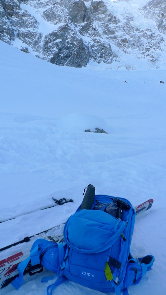 The Haglöfs VOJD 18 ABS Ski Pack, showing the shovel and probe being carried.