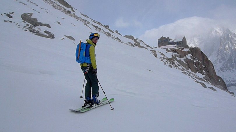 Outside the Requin Hut after skiing the classic Grand Envers route from the Aiguille du Midi, France.