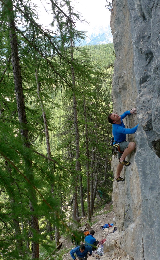 Haglöfs LIM Power Dry Hood - works well under a climbing harness and doesn't restrict movement. Unkown 7b at Tornoux.