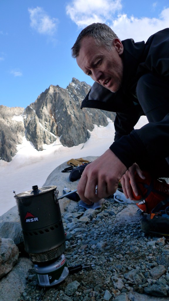 MSR Reactor Stove - boiling water at a bevy site opposite Barres Des Ecrins