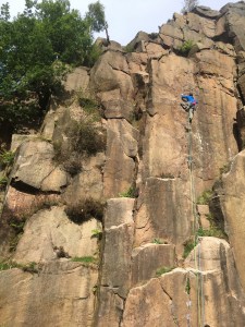 The Berghaus Extrem 7000 was light enough to wear on warm days. Great Peter E1 5b, Lawrencefield, Peak District.